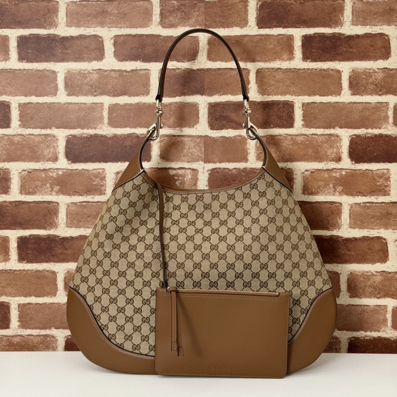 G*u*i top handle bags